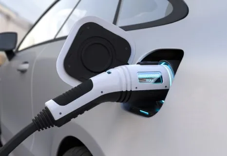 Close-up of an EV charging plug