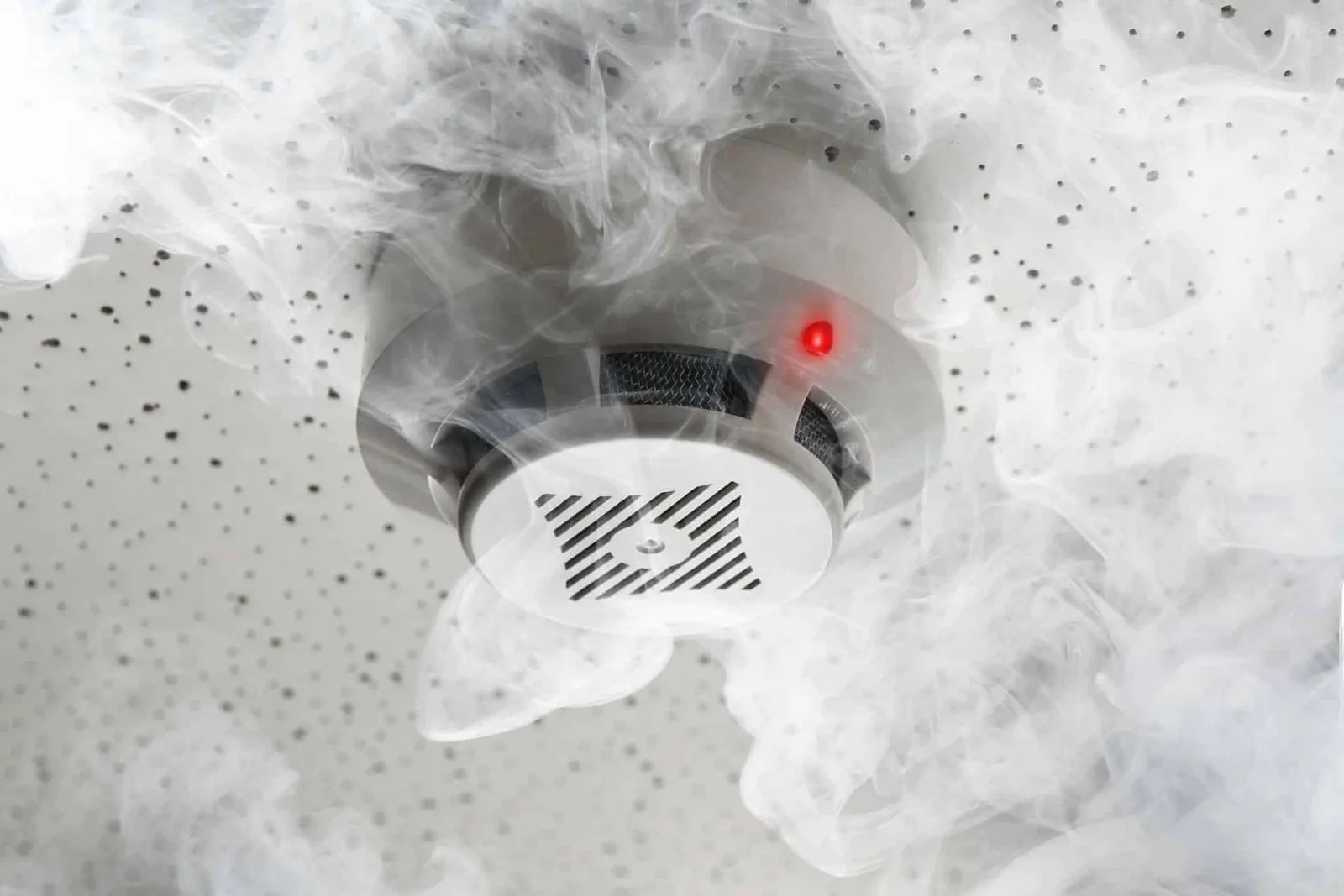 Smoke alarm being smoke tested