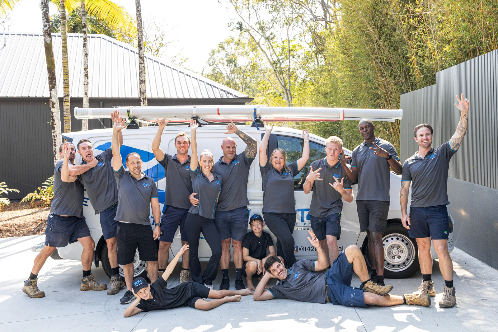 The local family-run electrical team celebrating a finished job